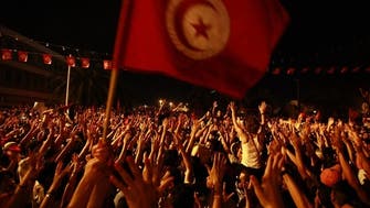 Tunisia sets December election, mourns slain soldiers 