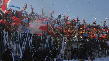 Al Ahly fans celebrate after their team scored a goal against derby rivals Zamalek during their CAF Champions League soccer match at El-Gouna stadium in Hurghada, about 464 km (288 miles) from the capital Cairo July 24, 2013. (Reuters)