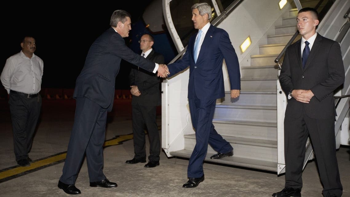 US Secretary of State John Kerry(R) is greeted by US Ambassador to Pakistan Richard Olson (2nd L) upon his arrival in Islamabad, Pakistan, July 31, 2013. (AFP)