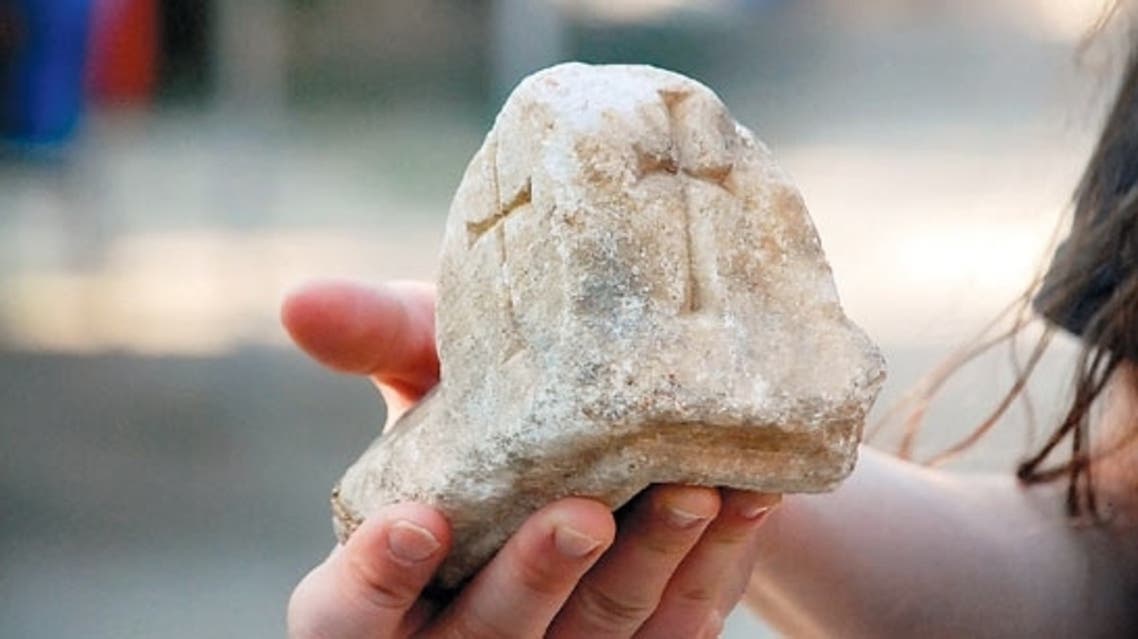 A piece of stone with crosses on it was found in the excavation of a church in Sinop. (Photo courtesy: Today Zaman)