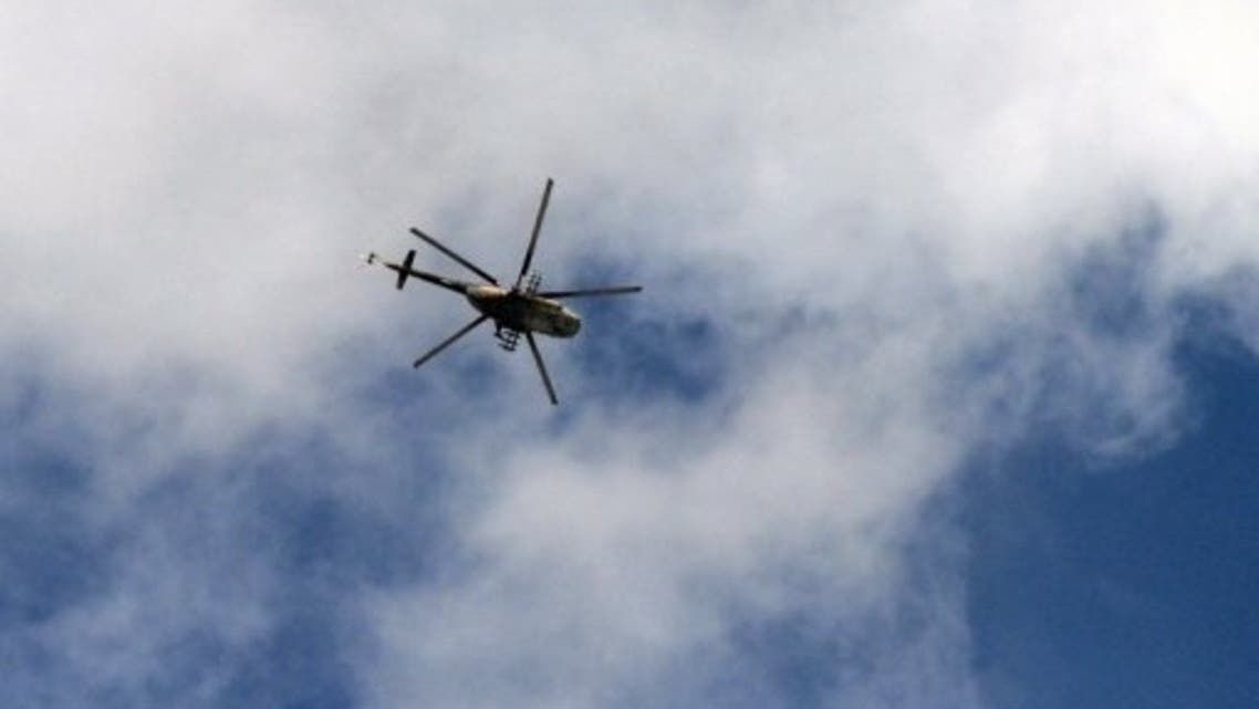 A Syrian army helicopter flies over the northern city of Aleppo on October 9, 2012. (File photo: AFP)