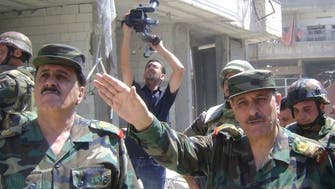 SANA: Syrian defense minister tours seized Homs district