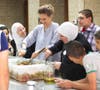 Syrian First Lady Asma al-Assad prepares a Ramadan meal for the poor on Saturday. (Photo courtesy: Syrian presidency’s Facebook page)