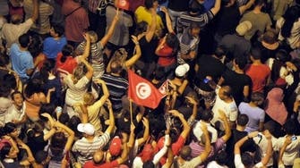 Tunisia Ennahda chief says protests will not topple government 