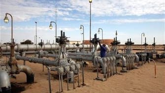 Oil prices slip as Libyan production bounces 