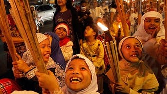 Muslims celebrate Ramadan end, strife casts shadow