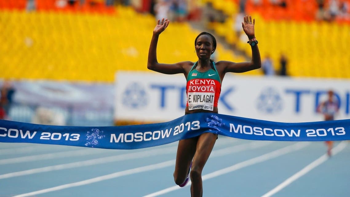 Edna Ngeringwony Kiplagat of Kenya crosses the finish line to win the women's marathon during the IAAF World Athletics Championships in Moscow, August 10, 2013.