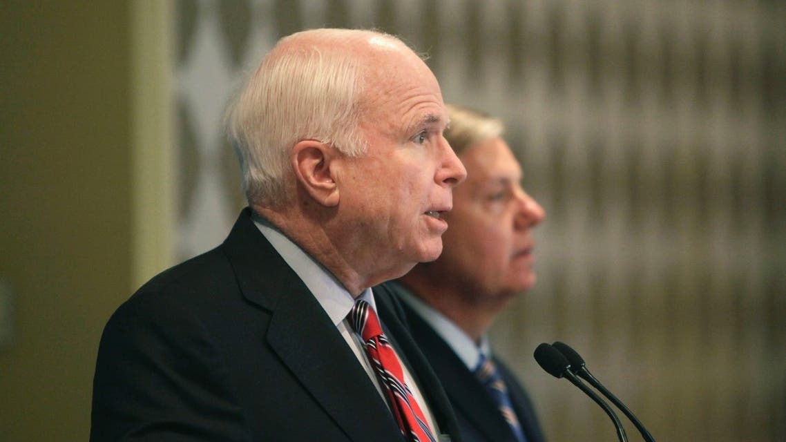 U.S. Senators John McCain and Lindsey Graham (R) address a news conference in Cairo, August 6, 2013. (Reuters)