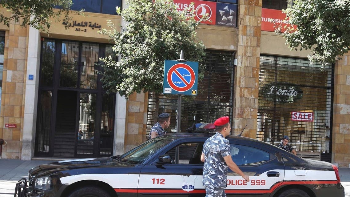 Lebanese security forces stand outside the Turkish Airlines office in downtown Beirut, August 9, 2013. (Reuters)