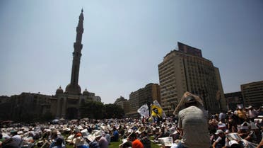 Members of the Muslim Brotherhood and supporters of ousted Egyptian President Mohamed Mursi attend Friday prayers at Ramses Square in Cairo August 16, 2013.