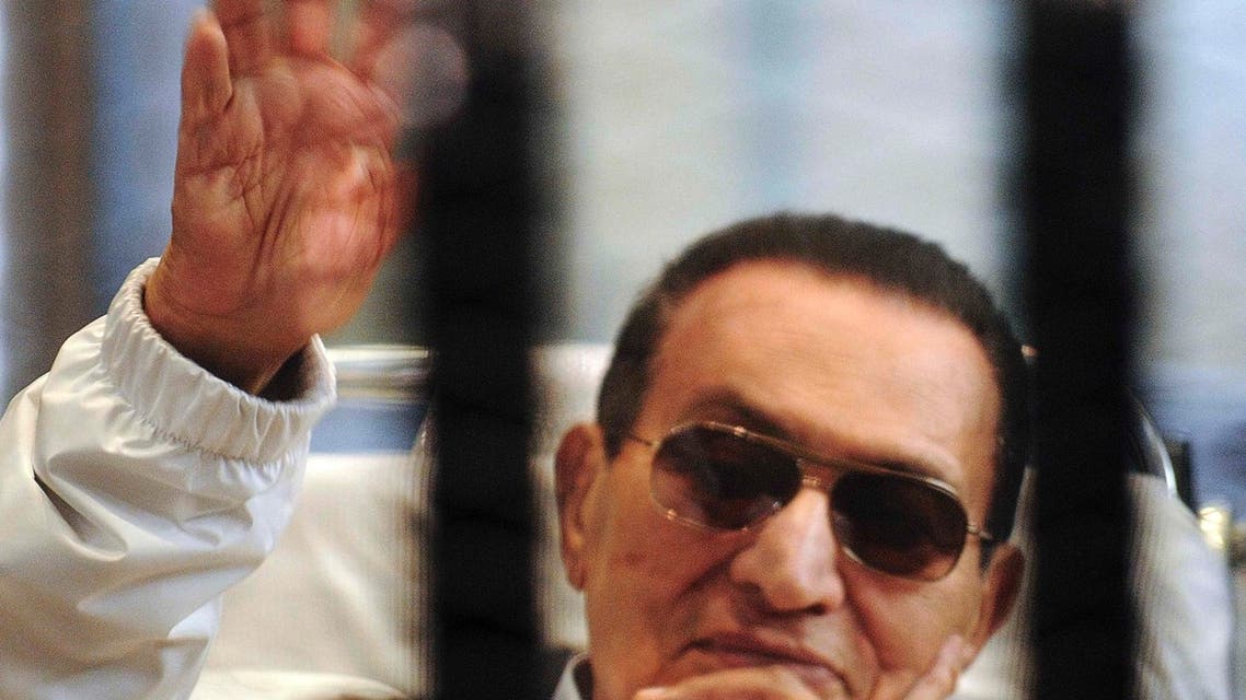 Egypt's ousted President Hosni Mubarak sits inside a dock at the police academy on the outskirts of Cairo, in this file picture taken April 15, 2013. (Reuters)