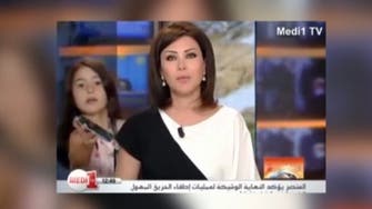 Syrian TV presenter surprised on air by own daughter