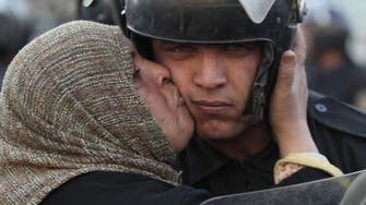 Kiss the crisis away? Egypt urged to celebrate ‘National Kissing Day’