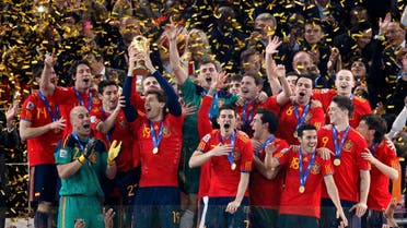 Spain's soccer team celebrates with the World Cup trophy after their final match victory over Netherlands (File Photo: Reuters)