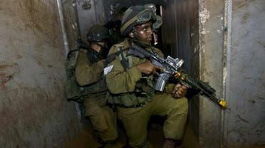 AFP Israeli infantry soldiers from the Kfir Brigade take part in a drill in urban warfare  Read more: