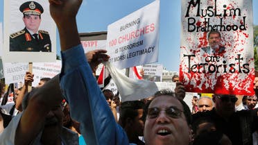 Protesters demonstrate against violence in Egypt in front of the White House while in Washington August 22, 2013. REUTERS