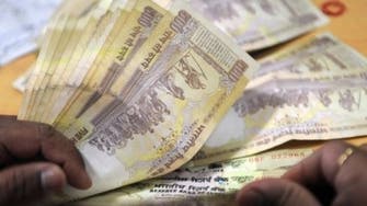 Indian rupee hits record low as confidence in government ebbs