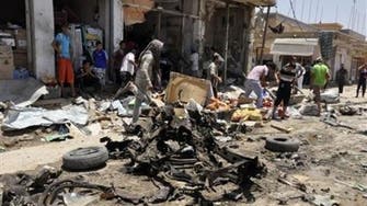 Iraq officials: 2 vehicle bomb blasts kill 23
