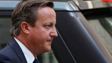 Britain’s Prime Minister David Cameron leaves Number 10 Downing Street to attend parliament in London Aug. 29, 2013. (Reuters)