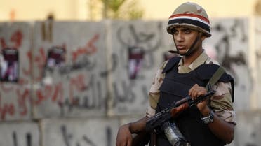 An Egyptian army soldier stands guard in front of the Ittihadiya presidential palace in Cairo. (File photo: Reuters)