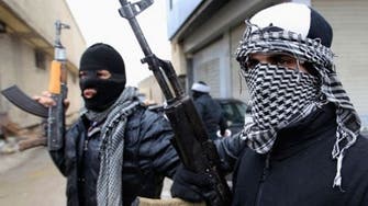 Iraqi militia vows to attack U.S. interests if Syria hit  