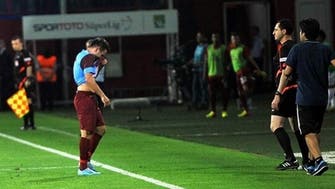 Football experts condemn abuse after Turkish player leaves match in tears
