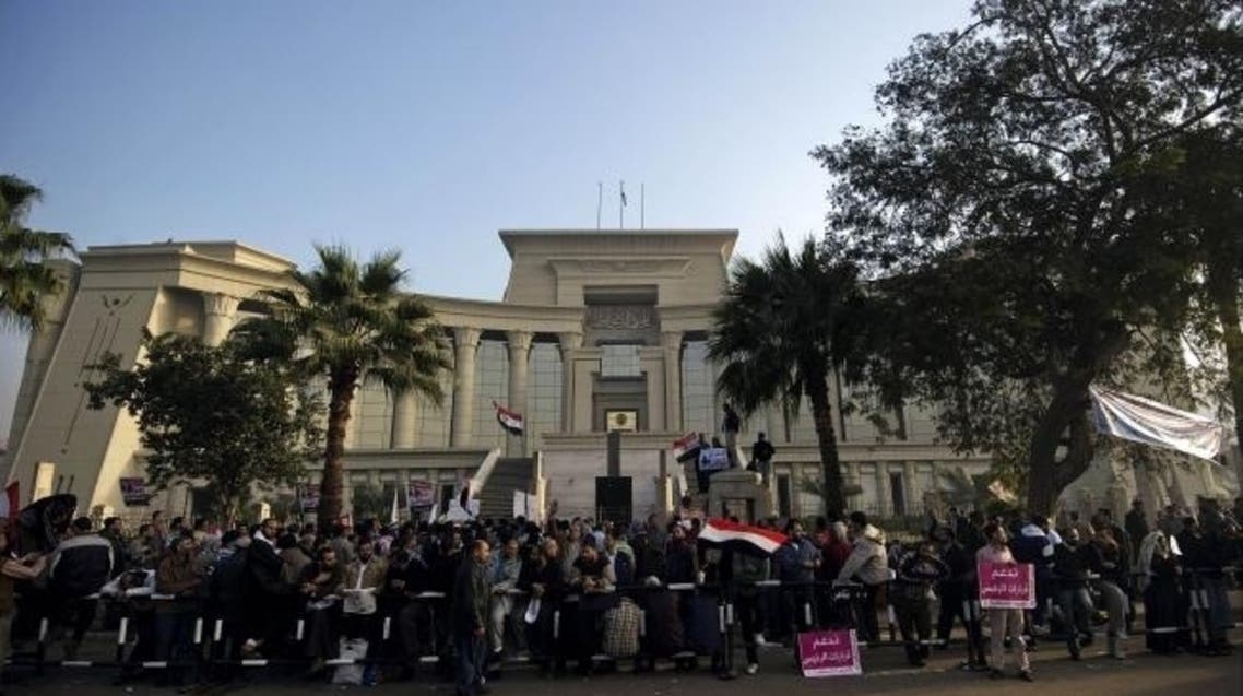 Hundreds of supporters of Egypt's former President Mohammad Mursi protested outside the Supreme Constitutional Court in December 2012. (AFP)