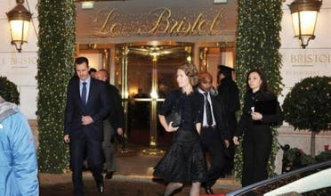 Syrian President Bashar al-Assad (L) and his wife Asma leave the Bristol hotel in Paris in 2010. (File Photo: AFP)