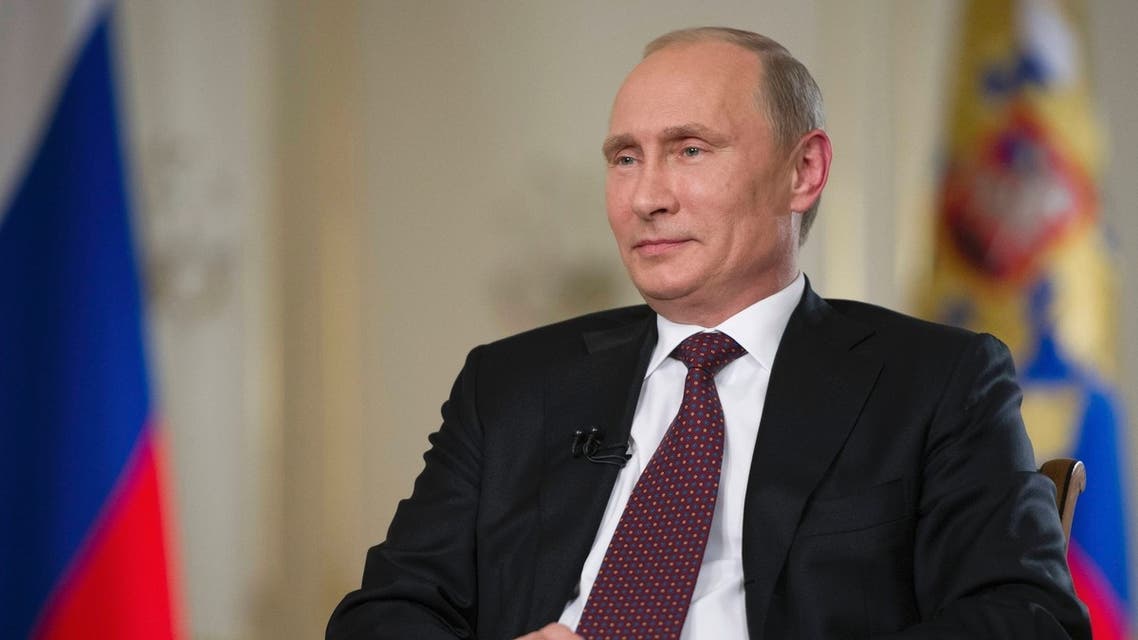 Russian President Vladimir Putin gives an interview at the Novo-Ogaryovo state residence outside Moscow September 3, 2013.