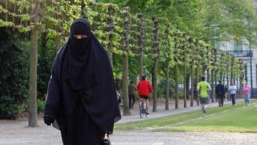 While many Muslim women in the UK wear the Muslim head scarf, very few of them wear the full face veil. (File photo: Reuters)