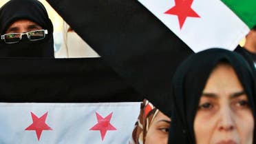 Syrians protest outside the Syrian embassy in Amman, Jordan, May 2012 reuters