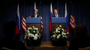 U.S. Secretary of State John Kerry gestures next to Russian Foreign Minister Sergey Lavrov (R) as they speak to the media before their meeting to discuss the ongoing crisis in Syria reuters