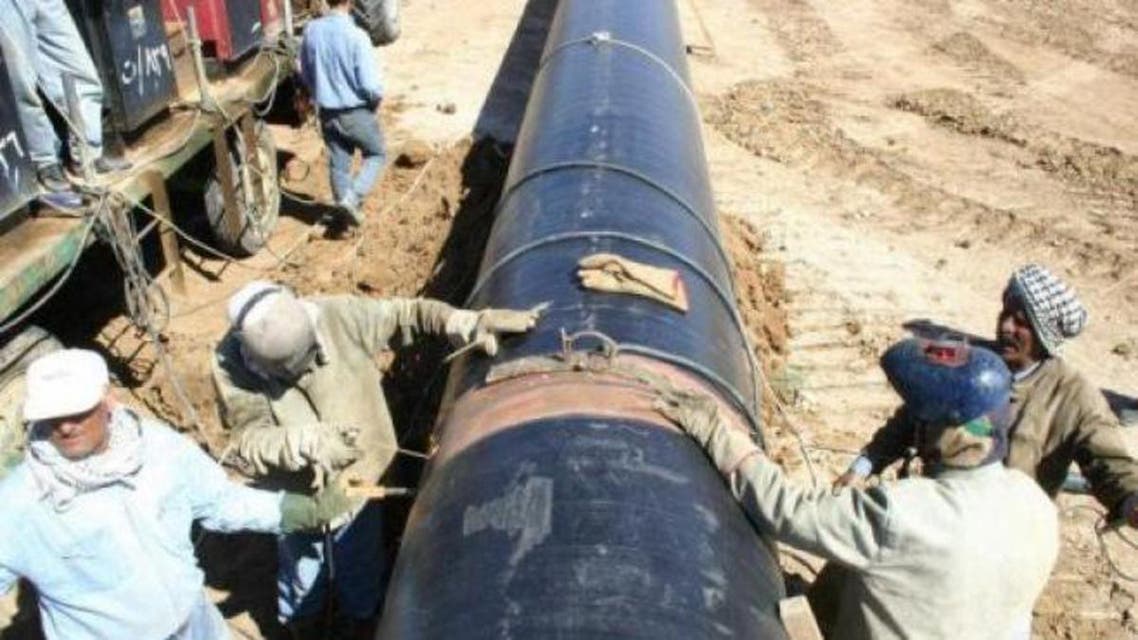 A file photo picture shows a Kirkuk-Turkey pipeline under repair. (AFP)