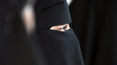 File picture shows a Muslim woman wearing the niqab in Montreuil near Paris on May 18, 2010 (AFP