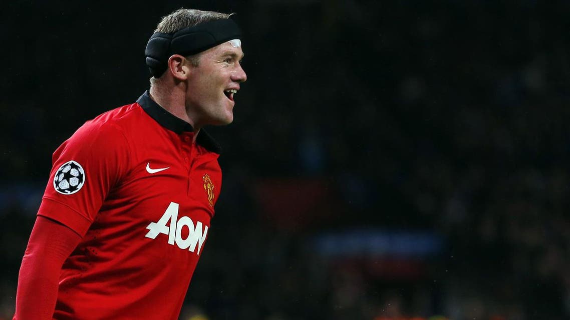 anchester United's English striker Wayne Rooney celebrates scoring a goal during the UEFA Champions League Group A football match football match between Manchester United and Bayer Leverkusen at Old Trafford in Manchester, north west England on September 17, 2013.