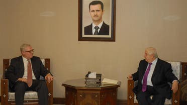 Syrian Foreign Minister Walid al-Muallem (R) meets Russian deputy Foreign Minister, Sergei Ryabkov,in Damascus,in this handout photograph distributed by Syria's national news agency SANA on September 17, 2013. (Reuters)