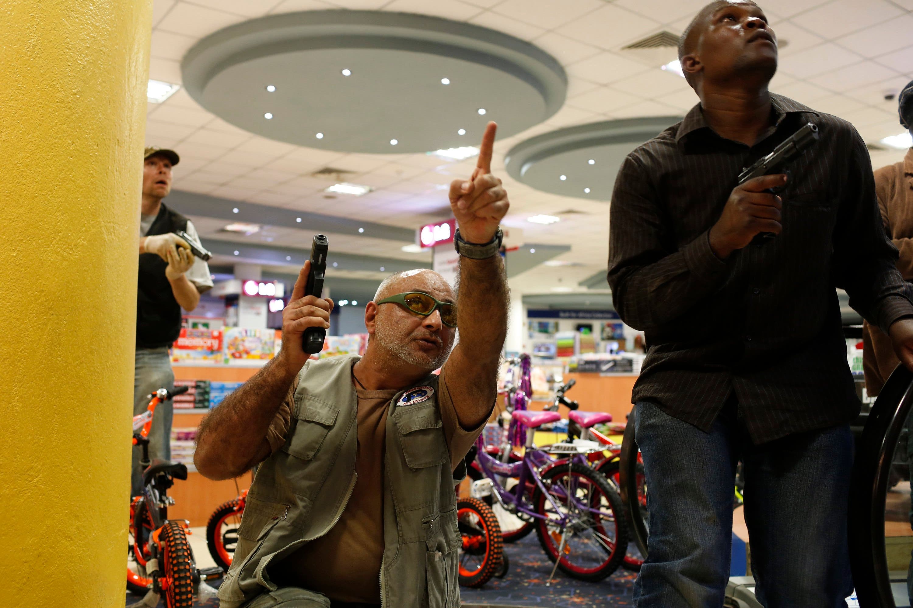 Security officers secure an area inside Westgate Shopping Centre in Nairobi. (Reuters)