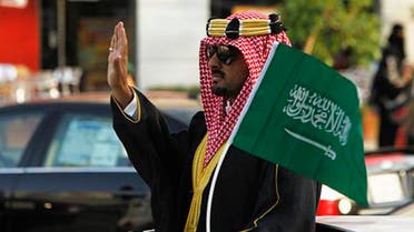 A man celebrates Saudi National Day in Riyadh on September 23, 2012.