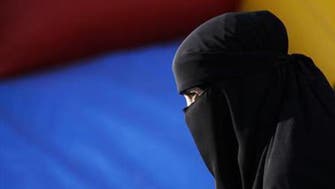 Southern Swiss voters back ban on full-face veils