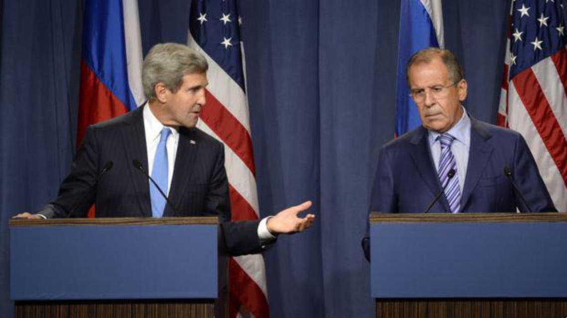 Russia's Foreign Minister Sergey Lavrov (R) and U.S. Secretary of State John Kerry hold a news conference at a hotel in Geneva September 12, 2013. afp