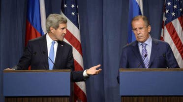 Russia's Foreign Minister Sergey Lavrov (R) and U.S. Secretary of State John Kerry hold a news conference at a hotel in Geneva September 12, 2013.  afp