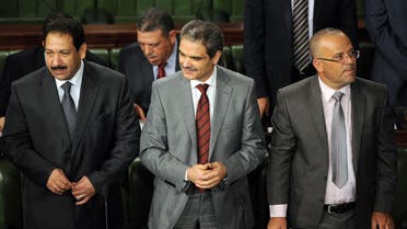 unisian Interior Minister Lotfi Ben Jeddou (L), Justice Minister Nadhir Ben Ammou (C) and Minister of Human Rights and Transitional Justice Samir Dilou (R) attend a constituent assembly meeting on Sept. 19, 2013 to discuss security issues. (AFP)