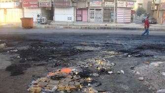 Militants kill 10 in attack on government offices in north Iraq