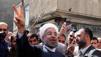 Iranians cheer, protest over Rowhani’s historic phone call with Obama