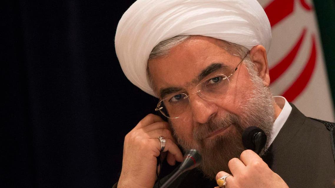 Iran's President Hassan Rouhani takes questions from journalists during a news conference in New York September 27, 2013