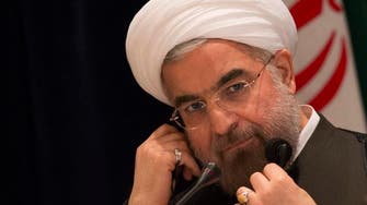 Bittersweet homecoming: Shoe thrown at Rowhani on return to Iran