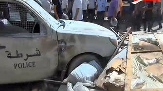 بائع متجول في تونس يضرم النار في سيارة للشرطة