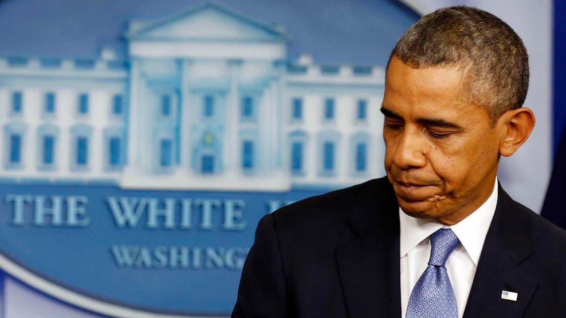U.S. President Barack Obama finishes a statement to the media about the government shutdown in the briefing room of the White House in Washington September 30, 2013.