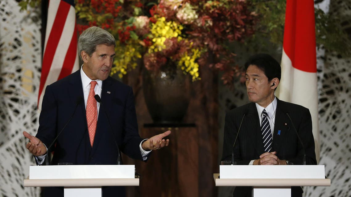 Secretary of State John Kerry (L) and Japan's Foreign Minister Fumio Kishida attend their joint news conference in Tokyo on October 3, 2013. (AFP)