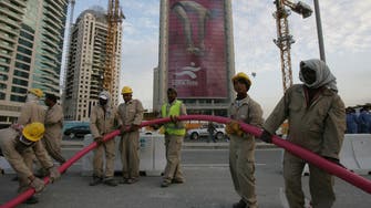 Qatar opens review of migrant worker conditions 